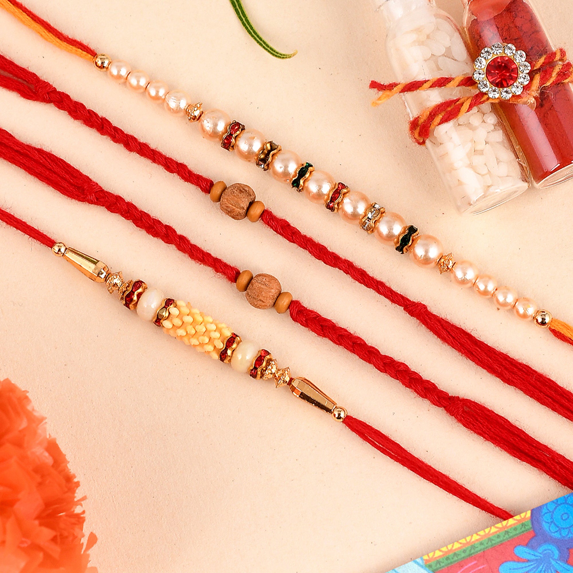 Shoshaa Set of 4 Red  Gold-Toned Rudraksh With White Beads Bhai Rakhis